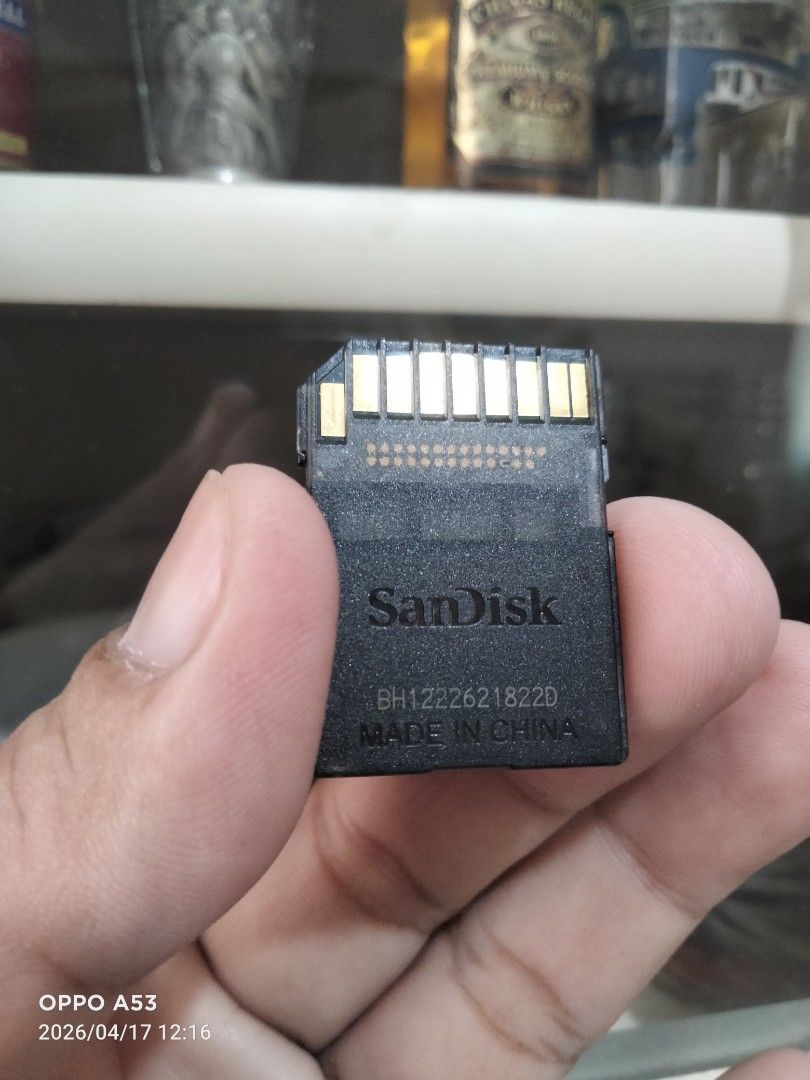 SanDisk Ultra 4GB SD Card (Category: Memory & SD Cards) located in Carmona. Submitted by rpute (Listing ID 1432636814, Image 3). Description: - SanDisk Ultra SD Card - 4GB Storage Capacity - 30MB/s Transfer Speed - Color: Black and Red - Includes SanDisk logo and "BH1222621822D MADE IN CHINA" text on the back..