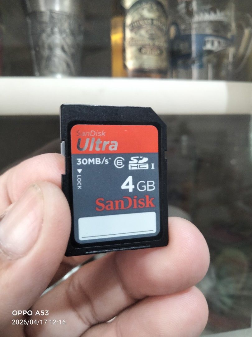 SanDisk Ultra 4GB SD Card (Category: Memory & SD Cards) located in Carmona. Submitted by rpute (Listing ID 1432636814, Image 1). Description: - SanDisk Ultra SD Card - 4GB Storage Capacity - 30MB/s Transfer Speed - Color: Black and Red - Includes SanDisk logo and "BH1222621822D MADE IN CHINA" text on the back..