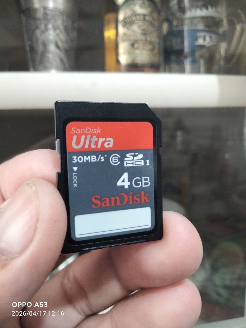 SanDisk Ultra 4GB SD Card (Category: Memory & SD Cards) located in Carmona. Submitted by rpute (Listing ID 1432636814, Image 2). Description: - SanDisk Ultra SD Card - 4GB Storage Capacity - 30MB/s Transfer Speed - Color: Black and Red - Includes SanDisk logo and "BH1222621822D MADE IN CHINA" text on the back..