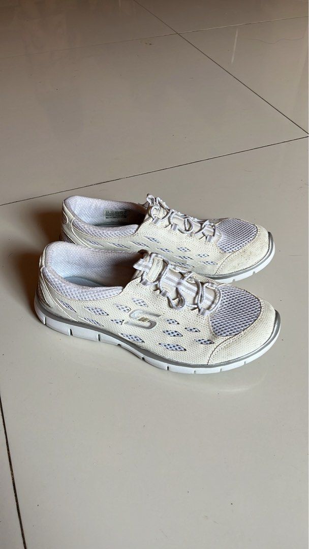 Skechers Memory Foam Sneakers - White (Category: Sneakers) located in Tacloban City. Submitted by priv_ (Listing ID 1432604624, Image 1). Description: - This Skechers sneakers feature a white and gray color scheme. - They have a mesh upper and a memory foam insole for added comfort. - size US 8.5. - The shoes have a lace-up closure and a sporty design, perfect for everyday wear. Mop: Gcash Location: Tacloban City.