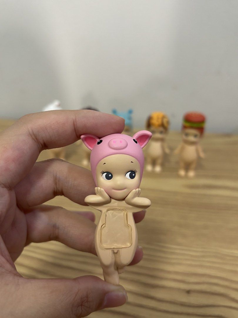SONNY ANGEL - NEGOTIABLE!!!! (Category: Designer & Blind Box Toys) located in Pasig City. Submitted by declutterbyshan (Listing ID 1432646860, Image 3). Description: FS SONNY ANGEL 👼 snack series: hamburger - ₱399 hippers: pig - ₱599 sweets series: cookie - ₱399 animal series v3: SOLD snake - ₱399 flower series: acorn - ₱399 rainy day: SOLD hippo - ₱599 with box and foil :) nego if getting 2 or more MOP: GCASH, GOTYME shipping via grab or lalamo