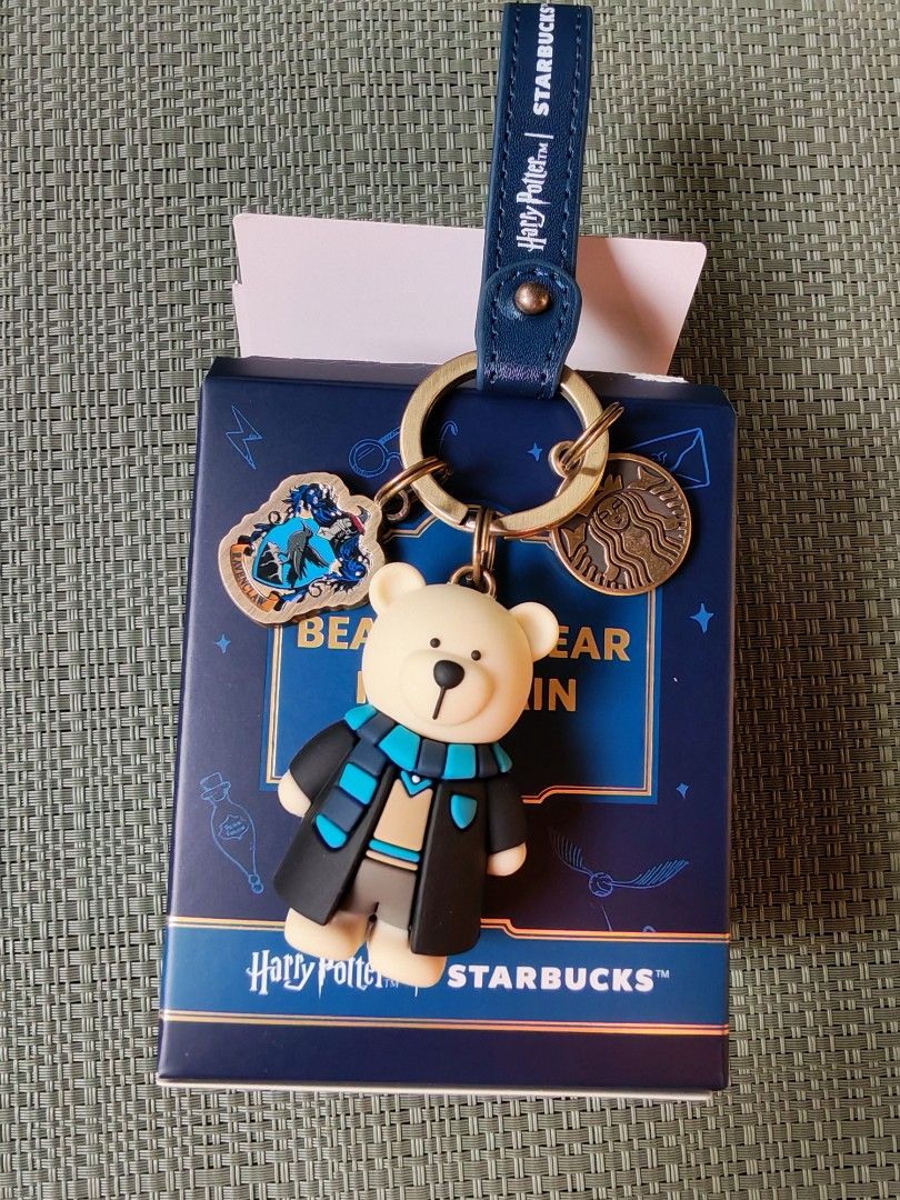 Starbucks Harry Potter Bearista Bear Keychain (Category: Character Goods) located in Quezon City. Submitted by danilo.danilo4 (Listing ID 1430899482, Image 3). Description: Collectible Starbucks Bearista Bear keychains featuring Harry Potter house themes. Each keychain comes in its original box. The keychains feature different colored scarves and straps, representing Gryffindor, Slytherin, Hufflepuff, and Ravenclaw. The keychains are new and unus