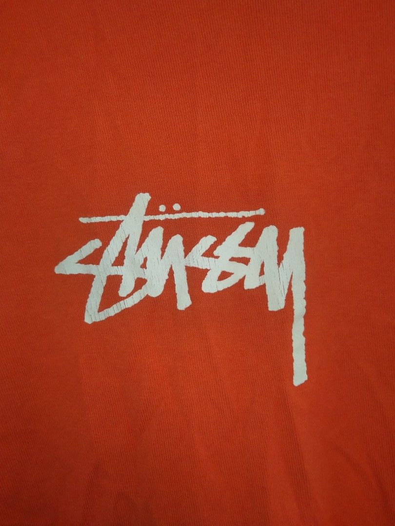 Stussy Orange T-shirt (Category: Tshirts & Polo Shirts ) located in Manila. Submitted by jaradhiggins24 (Listing ID 1432743141, Image 2). Description: - Stussy orange t-shirt - Size: M - Features the iconic Stussy logo - Made in Mexico - Material: 100% cotton - Care instructions: Machine wash cold, tumble dry low, do not bleach, do not iron.