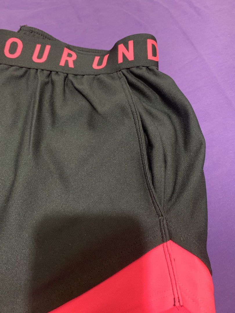 Under Armour Play Up Shorts 3.0 (Category: Shorts) located in Manila. Submitted by coolstuffonlyyy (Listing ID 1432631827, Image 3). Description: - Under Armour Play Up Shorts 3.0 (for running, gym & other sports activities) - Color: Black with pink accents - Size: MD/M/M Waistline: 37cm; Length:28cm - Fit: Loose (gartered) - Features: - Elastic waistband with Under Armour logo - Side pockets - Includes original price tag.