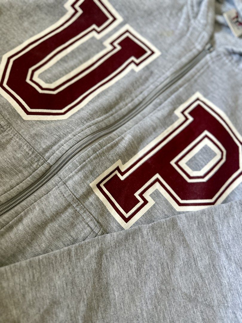 UP Fighting Maroons Zip Up Hoodie Varsity Jacket (Category: Coats, Jackets and Outerwear) located in Manila. Submitted by manifestd (Listing ID 1432636771, Image 2). Description: UP Fighting Maroons Zip Up Hoodie Varsity Jacket Unisex (bought at 1499) ✔️Light Gray, preloved in great condition ✔️Medium 21x26”, soft and thick cotton ✔️Full zip with front pockets ✔️RFS: decluttering, Lalamove ready *also available: UP maroon bomber jacket.