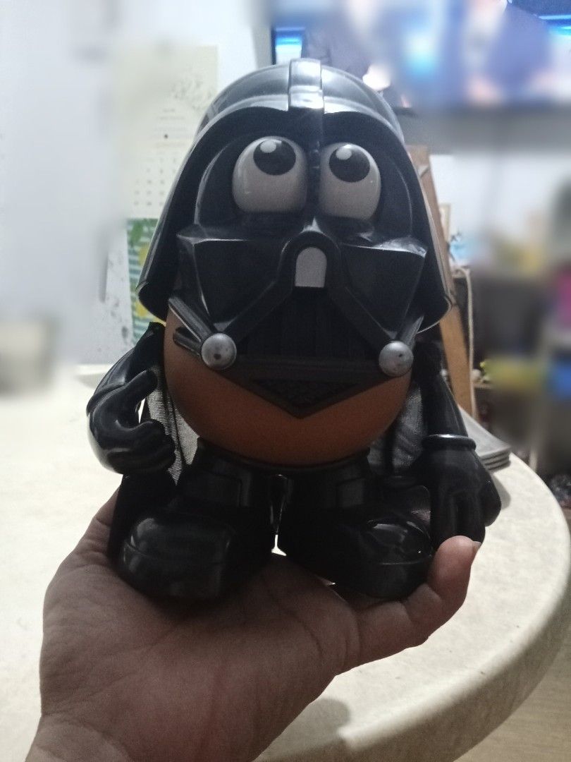 Vintage Mr. Potato Head Darth Vader (Category: Figurines & Statues) located in Bocaue. Submitted by marajapansurplus (Listing ID 1432724426, Image 2). Description: - Mr. Potato Head Darth Vader! - Features: Black helmet, mask, and cape. - Includes: Tan potato body, black arms, legs, and gloves. - Large, expressive eyes. - Condition: Good..