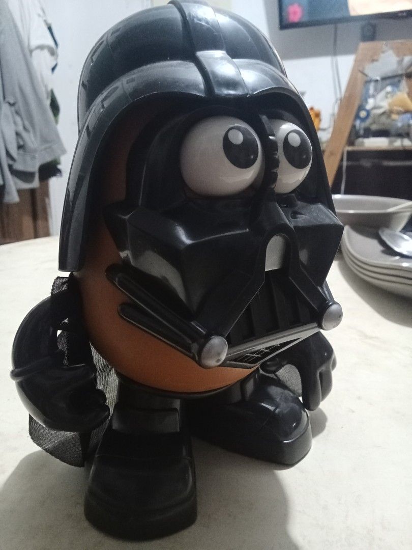 Vintage Mr. Potato Head Darth Vader (Category: Figurines & Statues) located in Bocaue. Submitted by marajapansurplus (Listing ID 1432724426, Image 3). Description: - Mr. Potato Head Darth Vader! - Features: Black helmet, mask, and cape. - Includes: Tan potato body, black arms, legs, and gloves. - Large, expressive eyes. - Condition: Good..