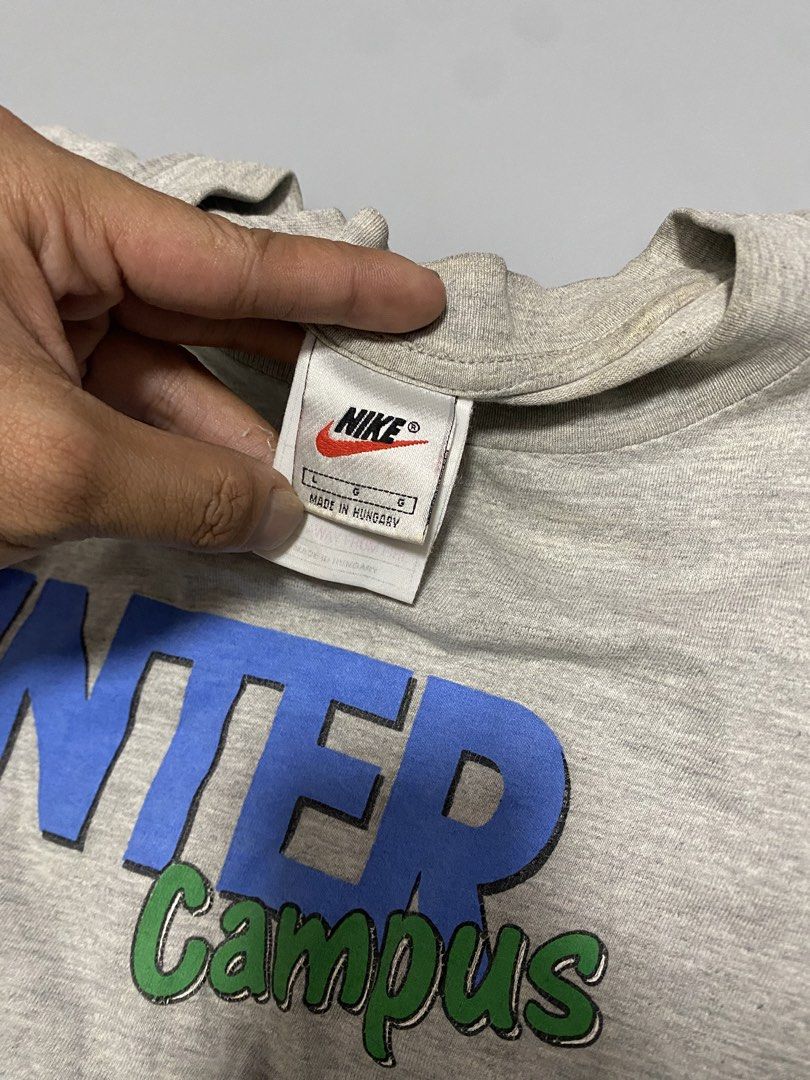 Vintage Nike Inter Campus T-shirt - Large (Category: Tshirts & Polo Shirts ) located in Manila. Submitted by owabaet12 (Listing ID 1432711065, Image 3). Description: - Vintage Nike Inter Campus T-shirt - Grey base color - Features blue and green "INTER Campus" print - Nike logo on front and back - Made in Hungary - Size: Large.