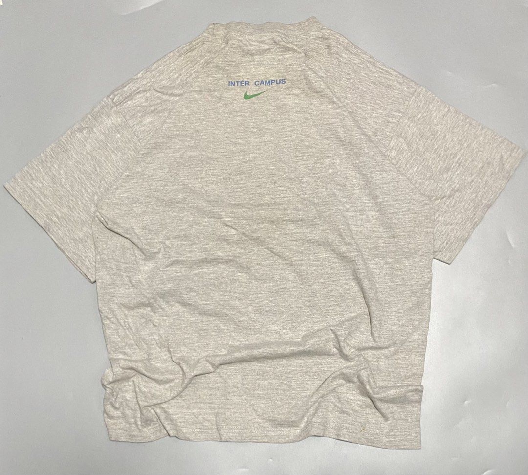 Vintage Nike Inter Campus T-shirt - Large (Category: Tshirts & Polo Shirts ) located in Manila. Submitted by owabaet12 (Listing ID 1432711065, Image 2). Description: - Vintage Nike Inter Campus T-shirt - Grey base color - Features blue and green "INTER Campus" print - Nike logo on front and back - Made in Hungary - Size: Large.