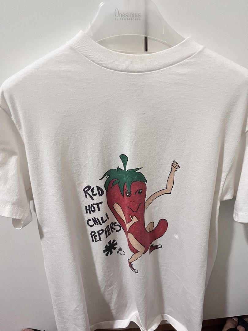 1992 delta tag Vintage Red Hot Chili Peppers (Category: Tshirts & Polo Shirts ) located in Catmon. Submitted by cj_jin08 (Listing ID 1432718607, Image 1). Description: - Vintage Red Hot Chili Peppers t-shirt - Features iconic chili pepper graphic - Classic crew neck - Color: White - Size: Large - Made in the USA.