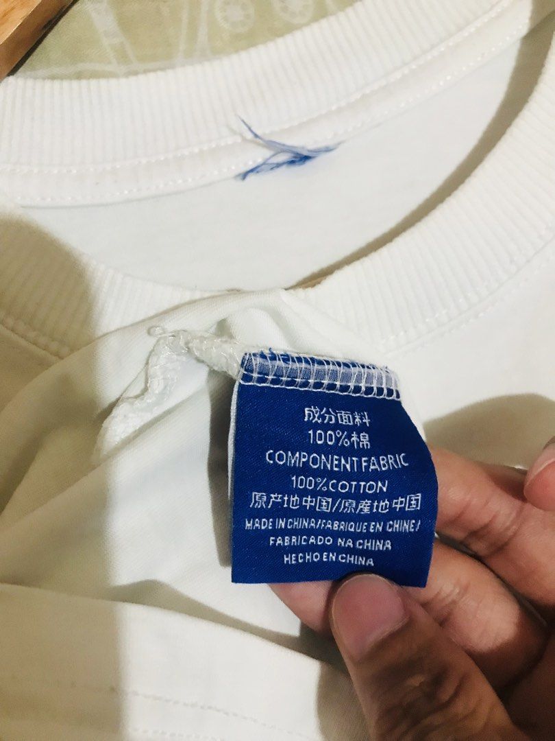 Wassup White T-shirt (Category: Tshirts & Polo Shirts ) located in Rizal. Submitted by drthriftfour (Listing ID 1432616357, Image 3). Description: - White Wassup T-shirt - Made of 100% cotton - Features a small blue Wassup logo on the front - Made in China - Approximately 24 inches in length - Crew neck and short sleeves.