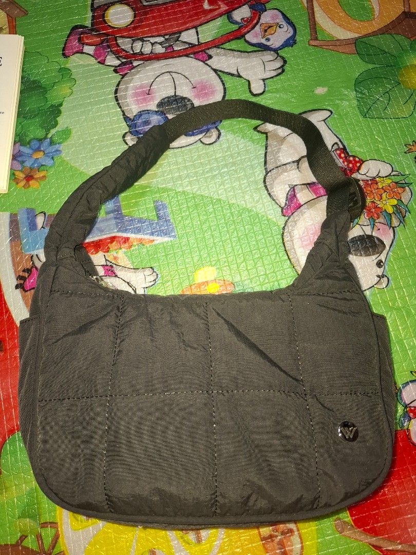 WESTBRONCO Black Quilted Shoulder Bag (Category: Shoulder Bags) located in Manila. Submitted by biabits (Listing ID 1432635117, Image 3). Description: - Black quilted shoulder bag - Single shoulder strap - Snap closure - Smooth, possibly nylon-like material - Ideal for everyday use - Spacious .