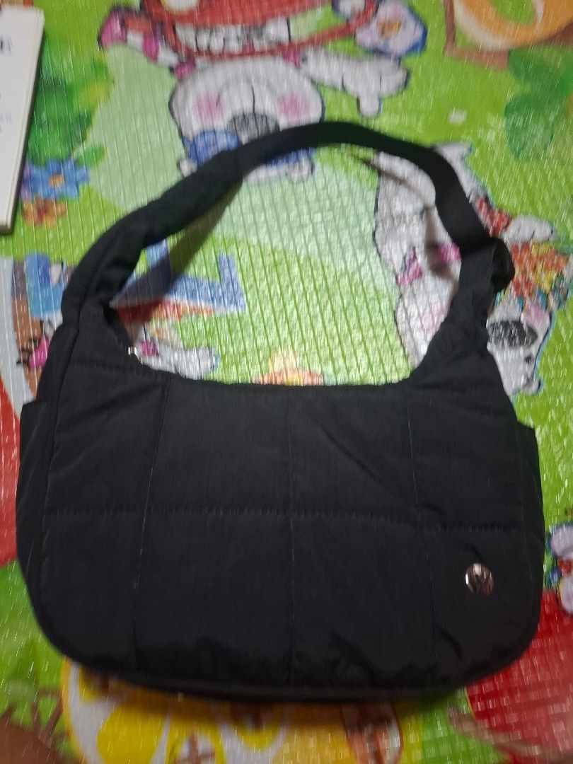 WESTBRONCO Black Quilted Shoulder Bag (Category: Shoulder Bags) located in Manila. Submitted by biabits (Listing ID 1432635117, Image 1). Description: - Black quilted shoulder bag - Single shoulder strap - Snap closure - Smooth, possibly nylon-like material - Ideal for everyday use - Spacious .