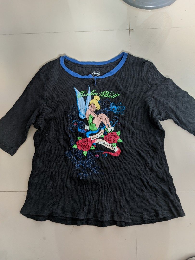 Y2k Disney Tinker Bell Shirt (Category: Shirts) located in Gapan. Submitted by ukayukay9 (Listing ID 1432671958, Image 2). Description: XL Tinker Bell long-sleeved shirt. Features a vibrant graphic with 'Believe in Yourself' text, blue trim, button detail, and Disney logo..