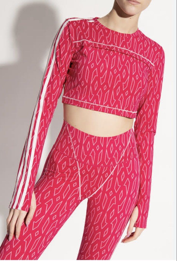 Adidas x Ivy Park Crop Top (Category: Longsleeves) located in Baguio. Submitted by silverearth-fa56 (Listing ID 1432864498, Image 2). Description: - Adidas x Ivy Park crop top - Vibrant pink pattern - Long sleeves with white stripes - Features Adidas logo - Includes Ivy Park tag - Size 10 S-semi med.