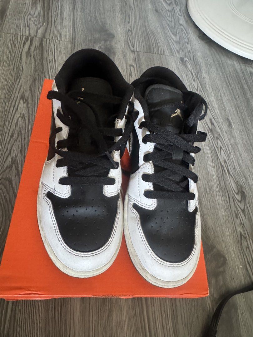 Air Jordan 1 Low Black Gold (Category: Babies & Kids Fashion) located in Las Pinas. Submitted by freeeezt (Listing ID 1432849391, Image 3). Description: - Air Jordan 1 Low sneakers - Colorway: Black, white, and gold - Features Air Jordan logo - Black laces and tongue - Size: US 4.5Y - Comes with original box.