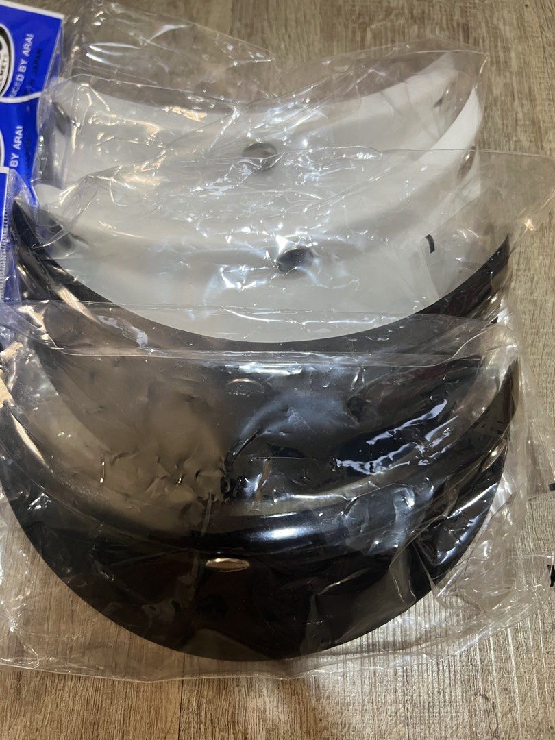 Arai, Bell & Extra Shield - Peak Cap Visor (3 Button) (Category: Motorcycle Accessories) located in Singapore. Submitted by frozenconstellations (Listing ID 1432854384, Image 2). Description: New in original packaging. For Arai Classic SW, Classic Air, Classic Mod Helmets etc For Bell (Left 1) May fit other helmets utilising 3 buttons type too Black (Arai and Bell) White (Arai) Silver (Arai) [Used] Yamashiro Extra Shield Bubble Visor (3 button) .