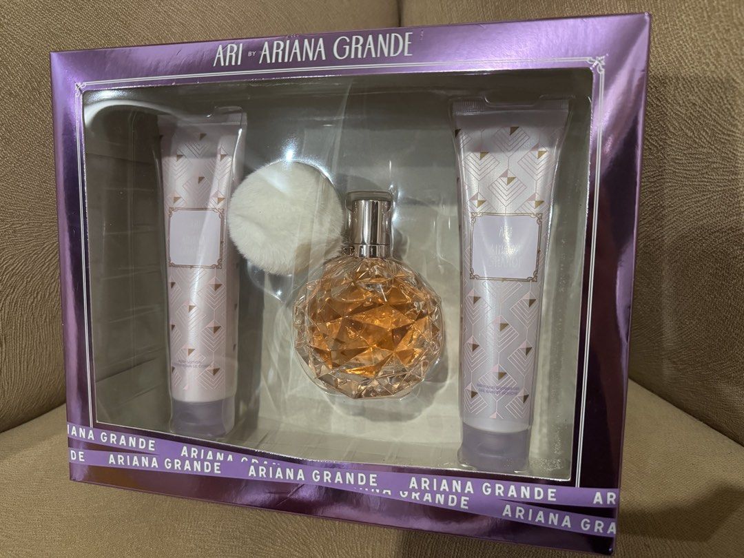 Ari by Ariana Grande Perfume Set (Category: Fragrance & Deodorants) located in Mabalacat. Submitted by legit_goodies (Listing ID 1432975663, Image 1). Description: - Ari by Ariana Grande fragrance set. - Includes a 3.4 fl oz (100 ml) Eau de Parfum spray. - Also includes a body lotion and a bath and shower gel. - Comes in a decorative box. - Features a unique, faceted perfume bottle design. PRICE IS SUPER LOW ALREADY, NO MORE HAGGLING.