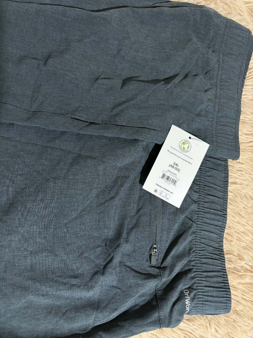 Athletic Works Men's Shorts (Category: Shorts) located in Pateros City. Submitted by armcandystuff (Listing ID 1432868250, Image 3). Description: - Athletic Works men's shorts - 48-50 inches waist - Solid teal color - Drawstring waistband - Back pocket with zipper - Dry-wick technology.
