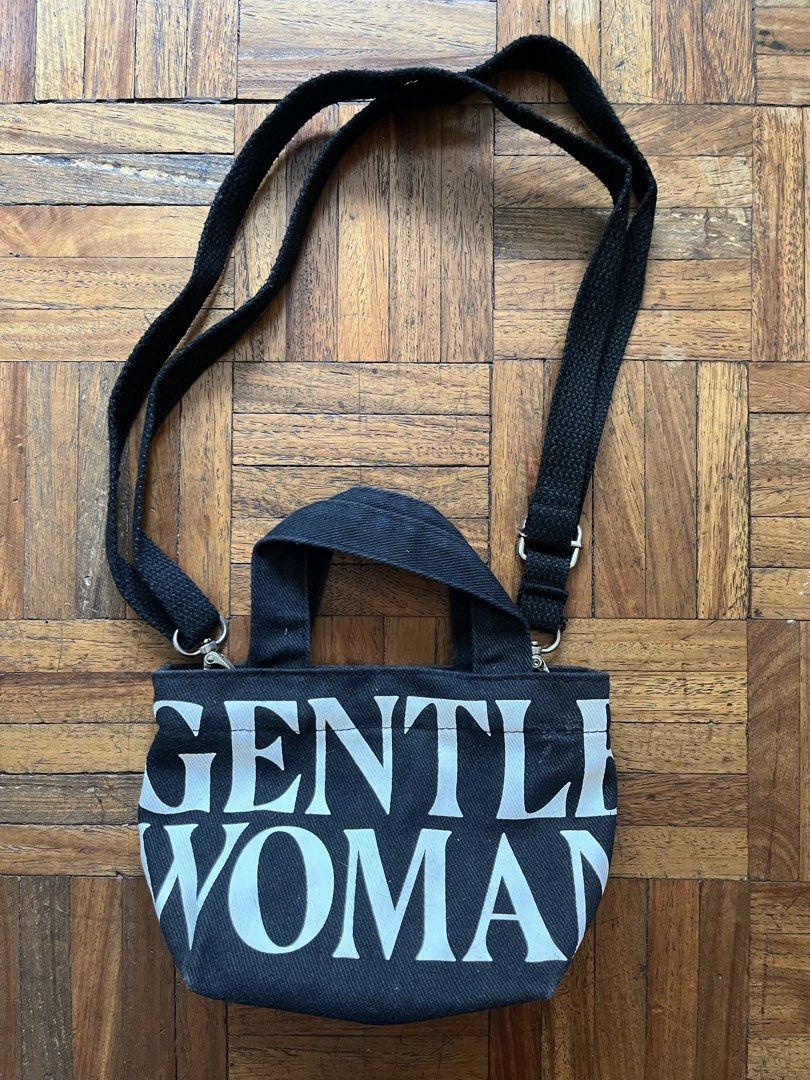 Authentic Gentlewoman Black Tote Bag (Category: Tote Bags) located in Makati City. Submitted by yoursecondbest (Listing ID 1432848230, Image 1). Description: - Gentlewoman black tote bag - Detachable and adjustable shoulder strap - Top handle - Snap closure - White Gentlewoman logo on front - Small size, ideal for essentials - Black interior.