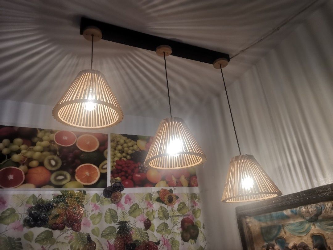 Bamboo Pendant Lamp - 3 Lights (Category: Lighting) located in Antipolo. Submitted by engineer25 (Listing ID 1432920349, Image 1). Description: - Bamboo pendant lamp with three lights - Black rectangular base - Woven bamboo lampshades - Creates a warm, ambient glow - Perfect for dining rooms and living areas.