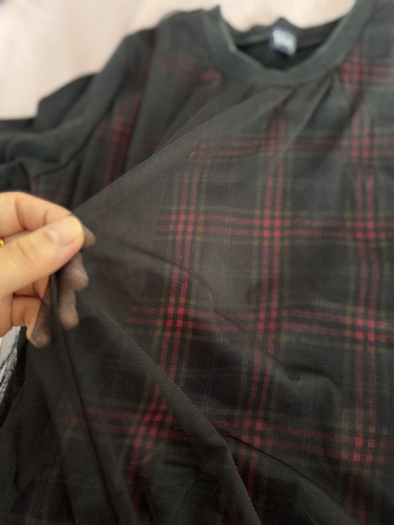 Black Plaid Mesh Gingham Overlay Sweater (Category: Coats, Jackets and Outerwear) located in Manila. Submitted by aimelamode (Listing ID 1432866461, Image 2). Description: - Black sweater - Plaid mesh overlay (red and green) - Round neckline - Long sleeves - Soft material.