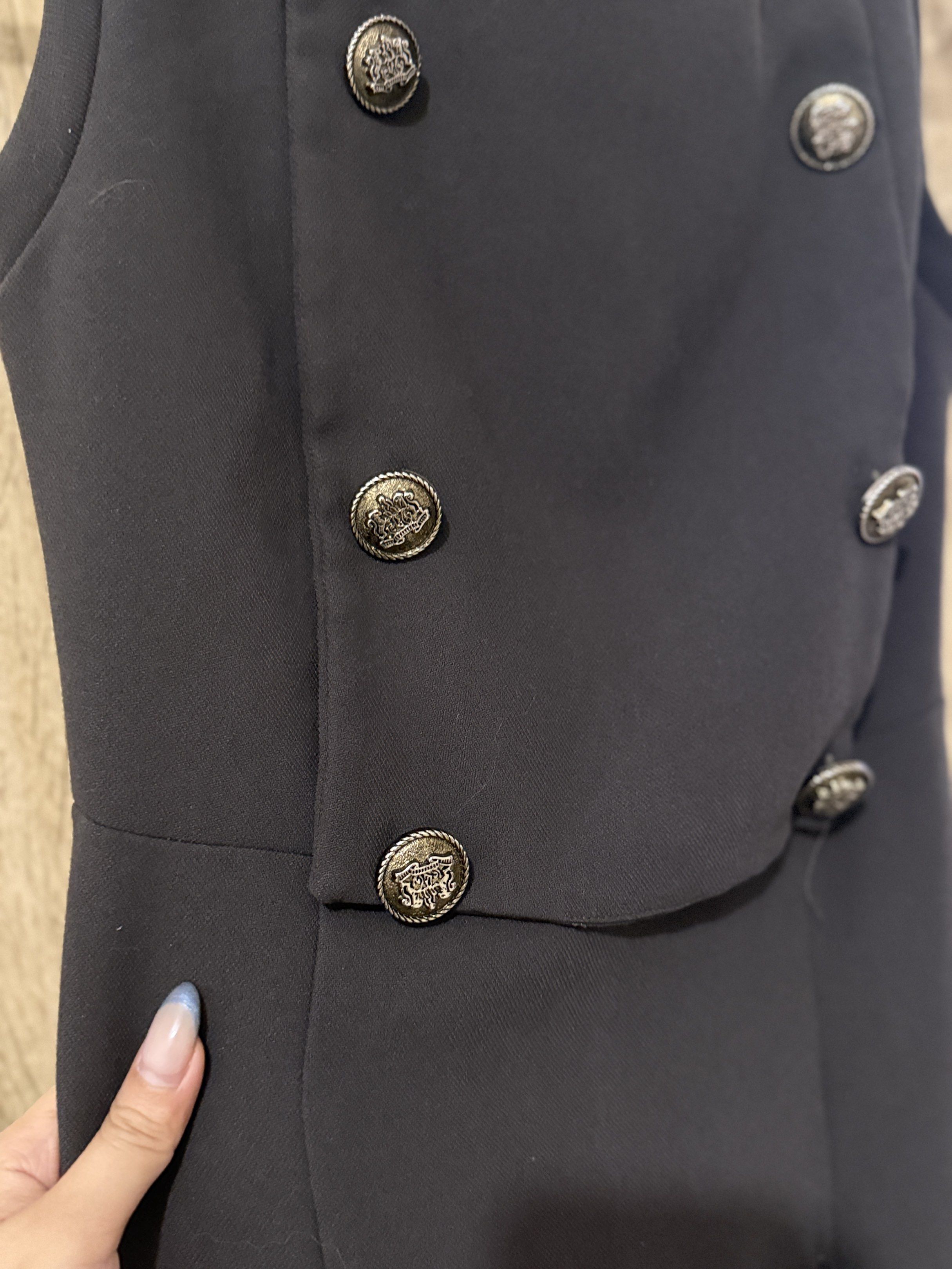 Black Sleeveless Dress with Buttons (Category: Dresses) located in Cebu City. Submitted by xishy (Listing ID 1432887777, Image 2). Description: - Black sleeveless dress - Decorative buttons - Fitted silhouette - Subtle flare at hem - Smooth, woven fabric - Ideal for formal events.