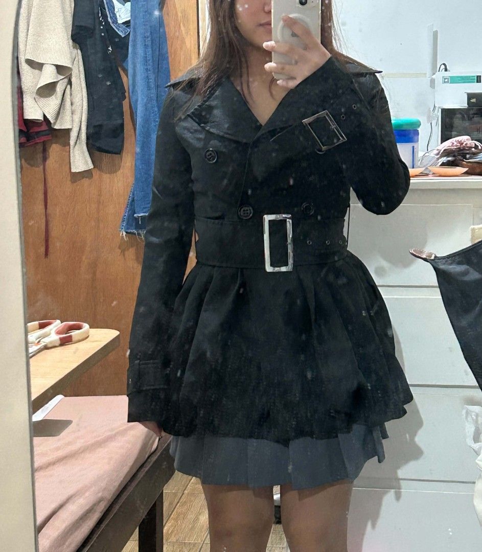 Black Trench Coat with Belt (Category: Coats, Jackets and Outerwear) located in Makati City. Submitted by gwentra (Listing ID 1432971224, Image 3). Description: - Black trench coat - Double-breasted design - Stylish belt with silver buckle - Balloon bottom - Classic collar - Adds sophistication to any outfit.