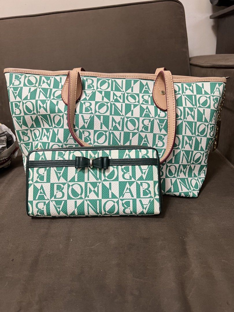 BONIA Handbag (Category: Luxury Bags & Wallets) located in Manila. Submitted by new.yvette (Listing ID 1432935797, Image 1). Description: - Authentic BONIA handbag - Interior leather tag with brand name and "8125-034-06-3" - Purple and gray patterned lining - Includes paper for storage.
