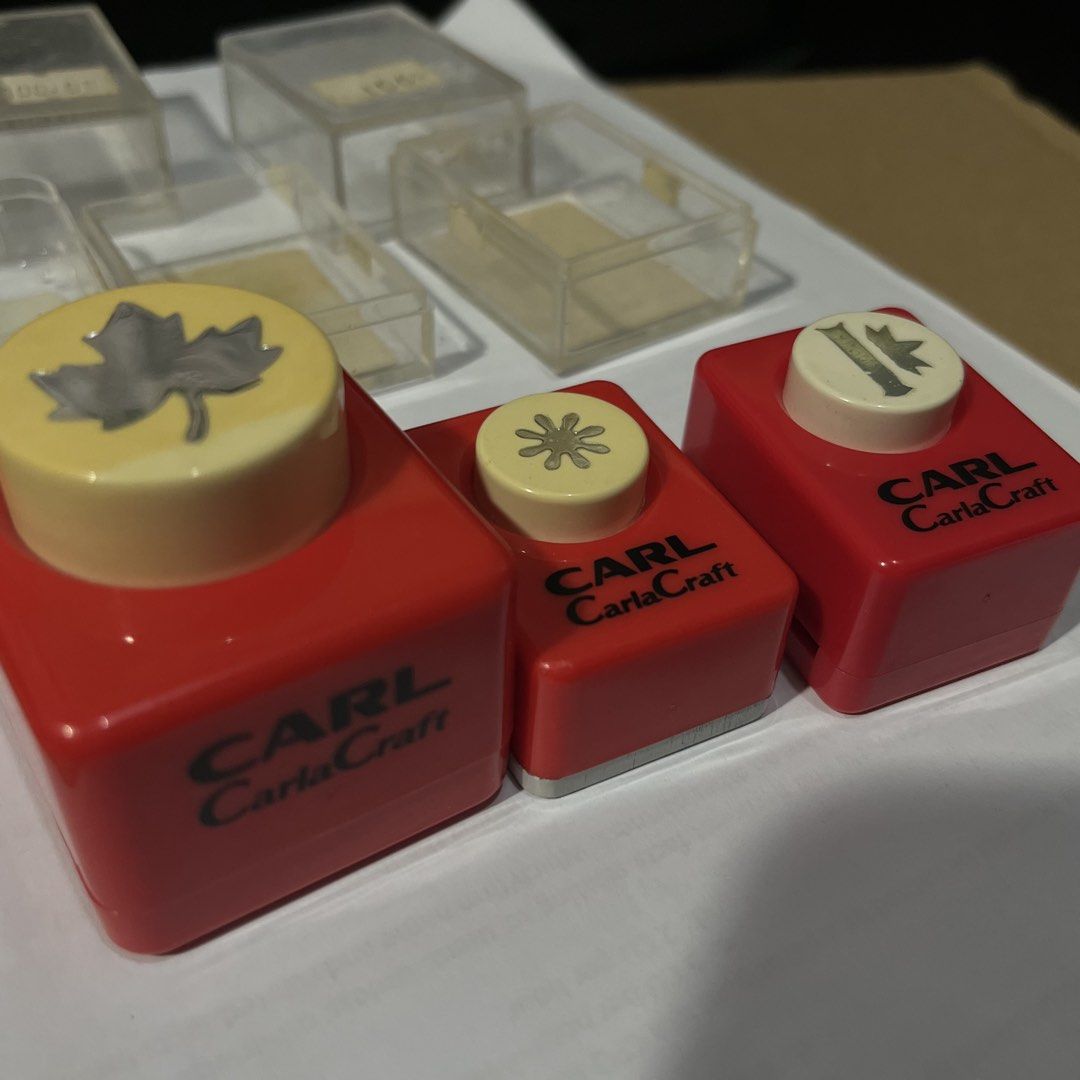 Carl Carla Craft Paper Punches Set (Category: Craft Supplies & Tools) located in Manila. Submitted by blootoosh (Listing ID 1432942975, Image 1). Description: 50% OFF for this set 🏷️‼️ Set of 3 Carl CarlaCraft paper punches - Designs: Leaf, flower, and more - Each punch includes its original plastic case - Prices: - ₱170 - ₱100 - ₱100 - Perfect for scrapbooking and crafting.
