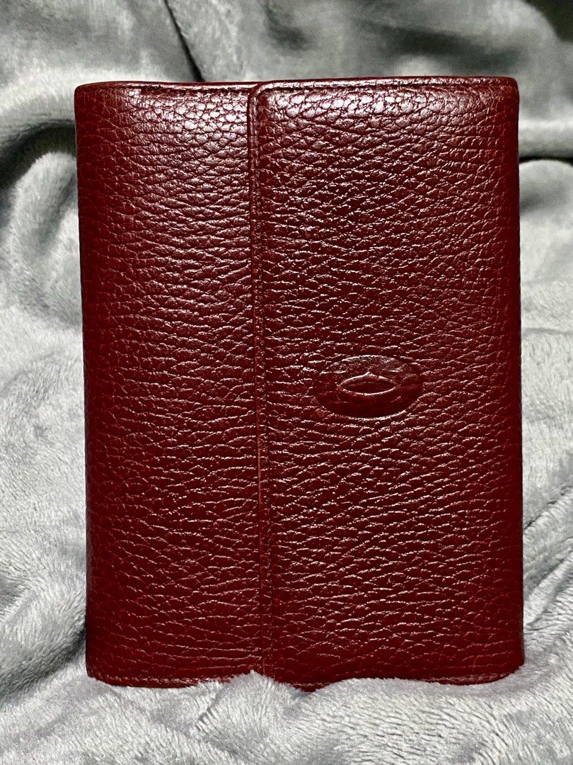 Cartier Must de Cartier Compact Tri-Fold Wallet (Category: Luxury Bags & Wallets) located in Manila. Submitted by byiammargaux (Listing ID 1432928647, Image 2). Description: CARTIER MUST de CARTIER TRIFOLD COMPACT WALLET AUTHENTIC Cartier burgundy leather wallet, the material appears to be high-quality leather, reflecting an elegant and timeless design typical of Cartier products. Crafted from smooth burgundy leather. •Burgundy •Calfskin Leather 