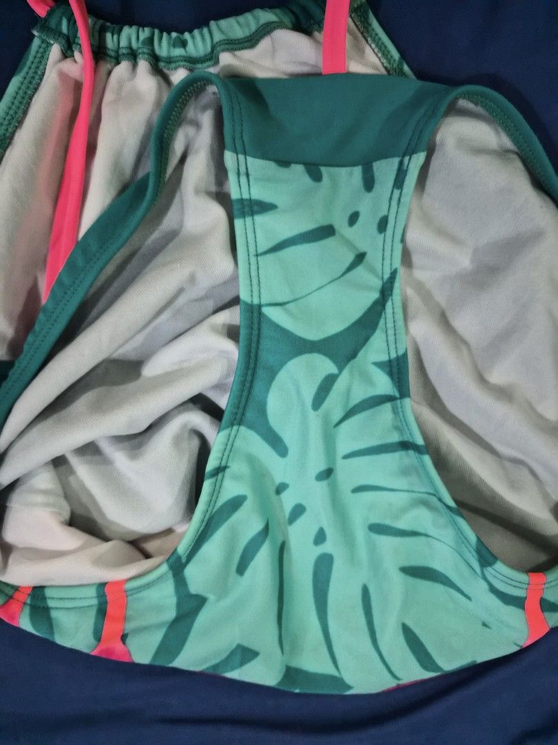Cat & Jack Flamingo Swimsuit (Category: Babies & Kids Fashion) located in Las Pinas. Submitted by ktcuartina (Listing ID 1432956942, Image 3). Description: - Flamingo design swimsuit - Size: L (10/12) - Color: Teal background with pink accents - Features: Pink straps - Made in Vietnam - White inner lining.