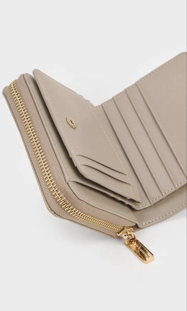 Charles & Keith Finley Wallet in Taupe (Category: Wallets & Card holders) located in Pasay City. Submitted by itabiyou (Listing ID 1432914677, Image 2). Description: - 4 months old - can take more pics if you like ! - comes with its original box & paper bag :> - used just a few times.