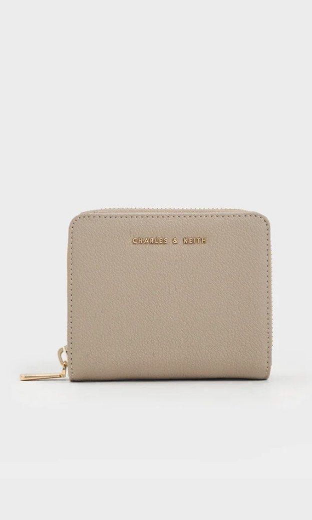 Charles & Keith Finley Wallet in Taupe (Category: Wallets & Card holders) located in Pasay City. Submitted by itabiyou (Listing ID 1432914677, Image 1). Description: - 4 months old - can take more pics if you like ! - comes with its original box & paper bag :> - used just a few times.