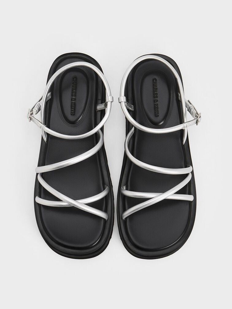 Charles & Keith Silver Open-Toe Strappy Platform Sandals (Size US6) (Category: Sandals) located in Paranaque City. Submitted by dlilly (Listing ID 1432893544, Image 2). Description: The ultimate "cool girl" sandals. Perfect for festivals, brunch dates, or elevating a basic jeans-and-tee look. RFS: Decluttering!.