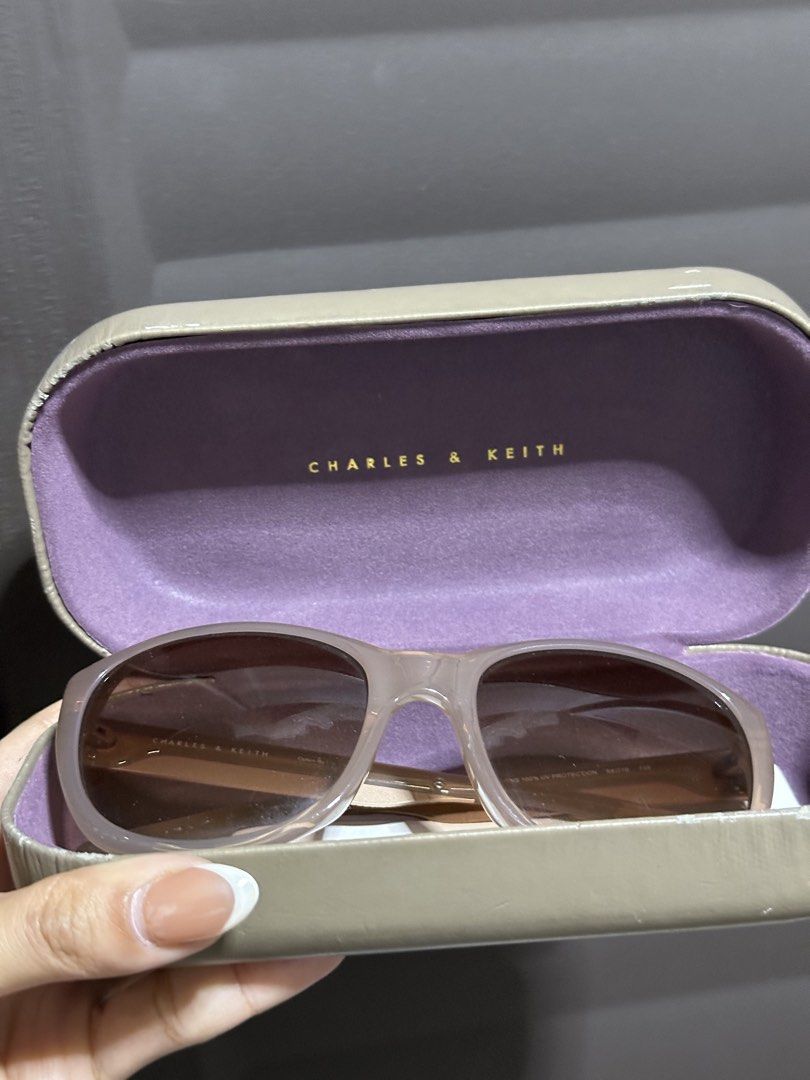 charles & keith purple sunglasses shades (Category: Sunglasses & Eyewear) located in Manila. Submitted by prelovedby.fel (Listing ID 1432840050, Image 2). Description: .