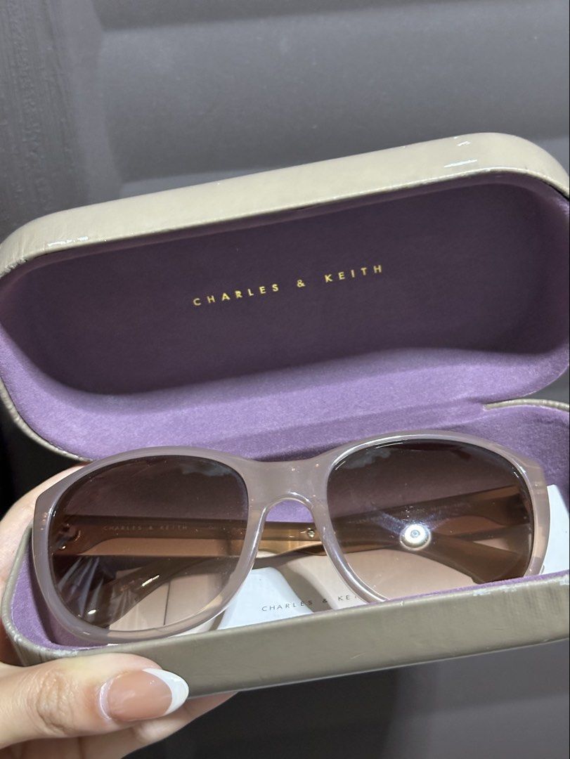 charles & keith purple sunglasses shades (Category: Sunglasses & Eyewear) located in Manila. Submitted by prelovedby.fel (Listing ID 1432840050, Image 1). Description: .