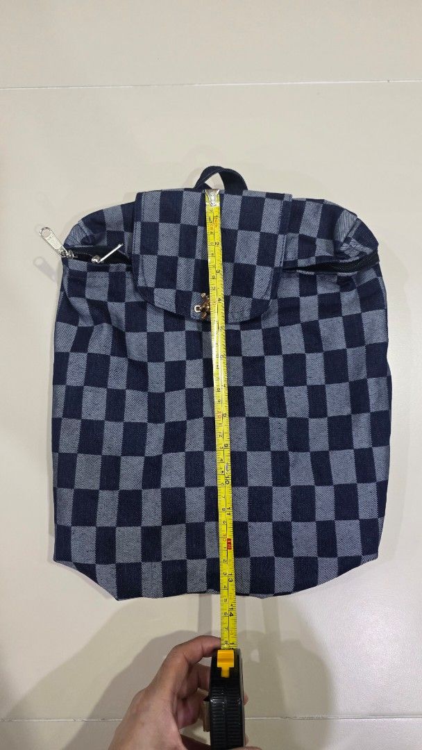 Checkered Pattern Backpack (Category: Backpacks) located in Singapore. Submitted by centrepiece_2025 (Listing ID 1432944494, Image 2). Description: Lovingly handmade from upcycled denim, each bag is unique—crafted in limited form, with no two pieces ever the same..