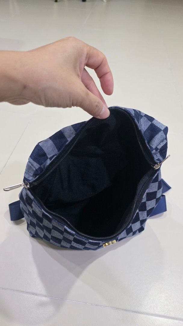 Checkered Pattern Backpack (Category: Backpacks) located in Singapore. Submitted by centrepiece_2025 (Listing ID 1432944494, Image 6). Description: Lovingly handmade from upcycled denim, each bag is unique—crafted in limited form, with no two pieces ever the same..