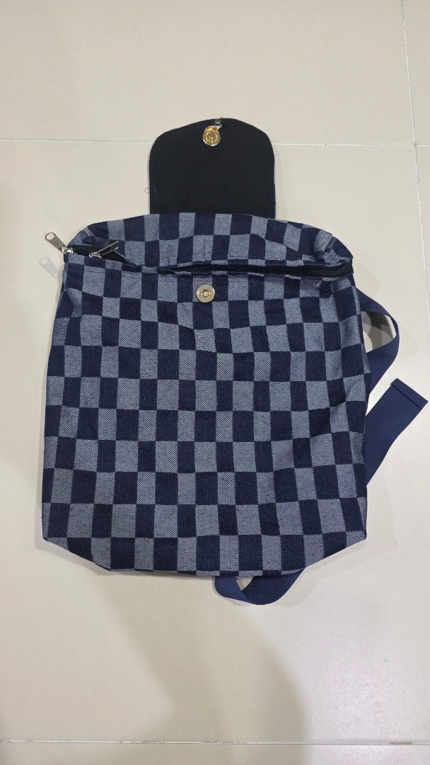 Checkered Pattern Backpack (Category: Backpacks) located in Singapore. Submitted by centrepiece_2025 (Listing ID 1432944494, Image 4). Description: Lovingly handmade from upcycled denim, each bag is unique—crafted in limited form, with no two pieces ever the same..