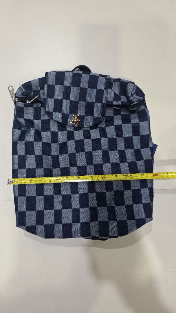Checkered Pattern Backpack (Category: Backpacks) located in Singapore. Submitted by centrepiece_2025 (Listing ID 1432944494, Image 1). Description: Lovingly handmade from upcycled denim, each bag is unique—crafted in limited form, with no two pieces ever the same..