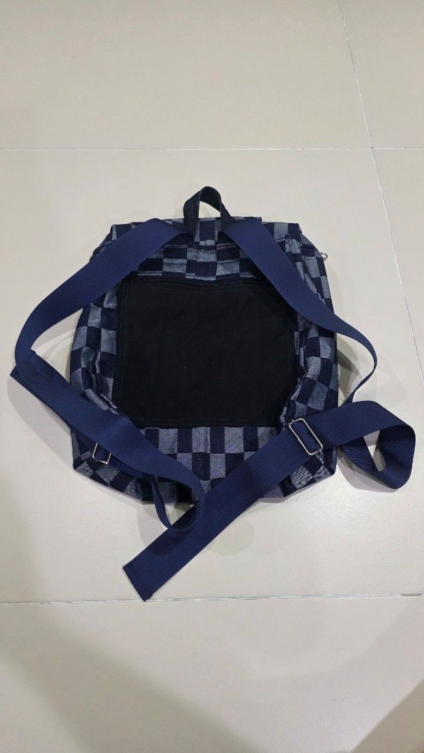 Checkered Pattern Backpack (Category: Backpacks) located in Singapore. Submitted by centrepiece_2025 (Listing ID 1432944494, Image 3). Description: Lovingly handmade from upcycled denim, each bag is unique—crafted in limited form, with no two pieces ever the same..