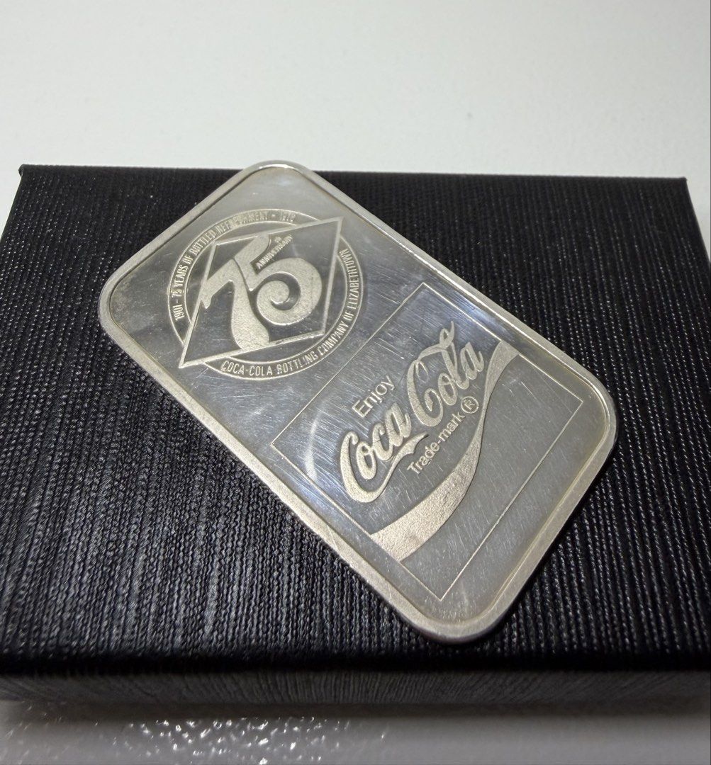 Coca-Cola 75th Anniversary Commemorative Fine Silver Bar (Category: Vintage Collectibles) located in Manila. Submitted by importgoodiesph (Listing ID 1432947393, Image 2). Description: Coca-Cola 75th Anniversary Commemorative Fine Silver Bar - in excellent condition - fine silver 0.999 - dimensions: 50 x 29 x 2mm - weight: 1 troy oz LBC shipping .