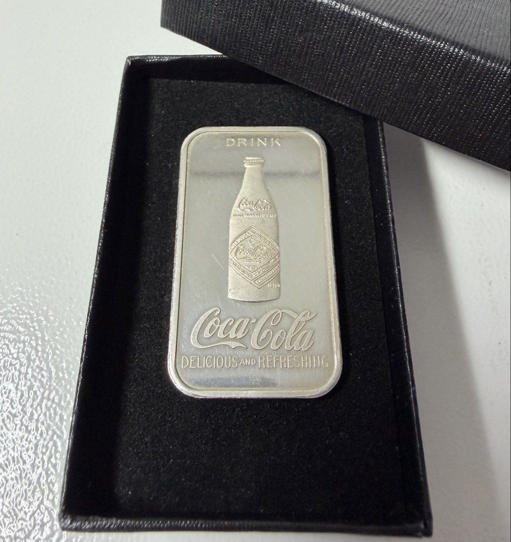 Coca-Cola 75th Anniversary Commemorative Fine Silver Bar (Category: Vintage Collectibles) located in Manila. Submitted by importgoodiesph (Listing ID 1432947393, Image 1). Description: Coca-Cola 75th Anniversary Commemorative Fine Silver Bar - in excellent condition - fine silver 0.999 - dimensions: 50 x 29 x 2mm - weight: 1 troy oz LBC shipping .