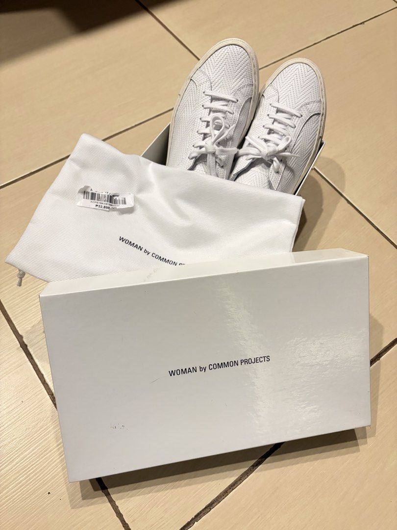 Common Projects Woman White Sneakers (Category: Sneakers) located in Taguig. Submitted by bubbabee (Listing ID 1432876885, Image 1). Description: - White Common Projects sneakers - Size 37 - Includes original box and dust bag - Original price was 32k pesos - Excellent condition.