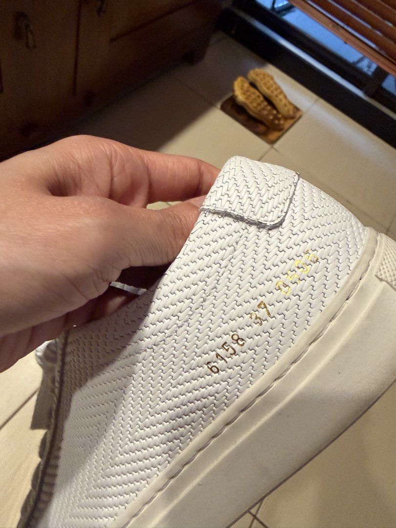 Common Projects Woman White Sneakers (Category: Sneakers) located in Taguig. Submitted by bubbabee (Listing ID 1432876885, Image 3). Description: - White Common Projects sneakers - Size 37 - Includes original box and dust bag - Original price was 32k pesos - Excellent condition.