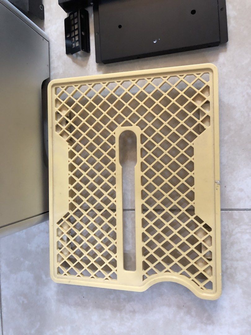 Computer casing (Category: Computer Parts) located in Singapore. Submitted by quantumvortex (Listing ID 1432855404, Image 2). Description: Not sure if parts or screws are complete. Plastic yellowing. Selling as-is for parts. Self collect from postal code 733688. Cash deal only. .