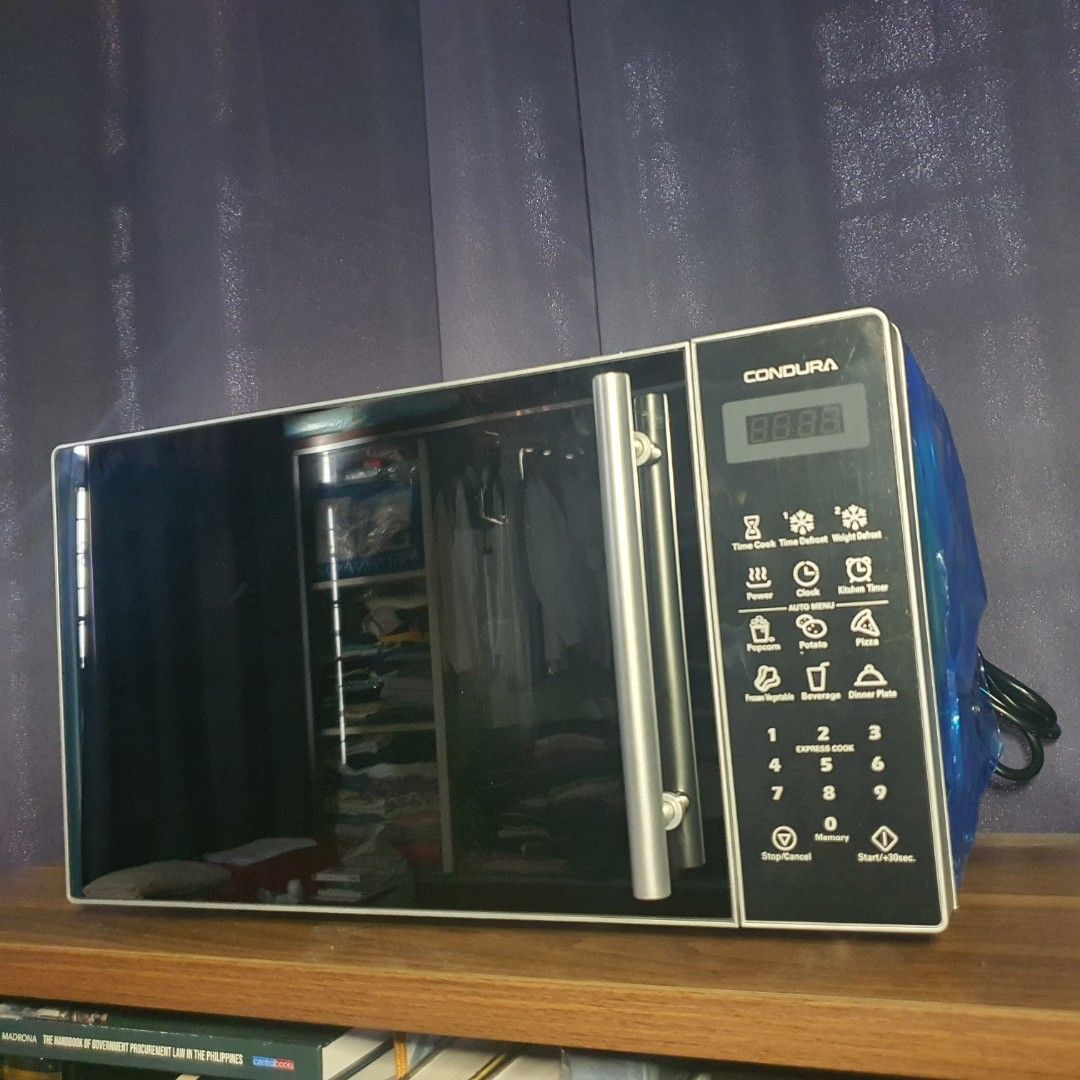 Condura digital microwave oven 20l (Category: Cookers) located in Manila. Submitted by bargain-master (Listing ID 1432928580, Image 1). Description: This is available as long as this is posted/visible listing. You may message me with the answer to the following questions once you are fully decided to purchase, should you need further thinking and canvassing you may just save the listing for future reference. 1. Will you be personally picking it u