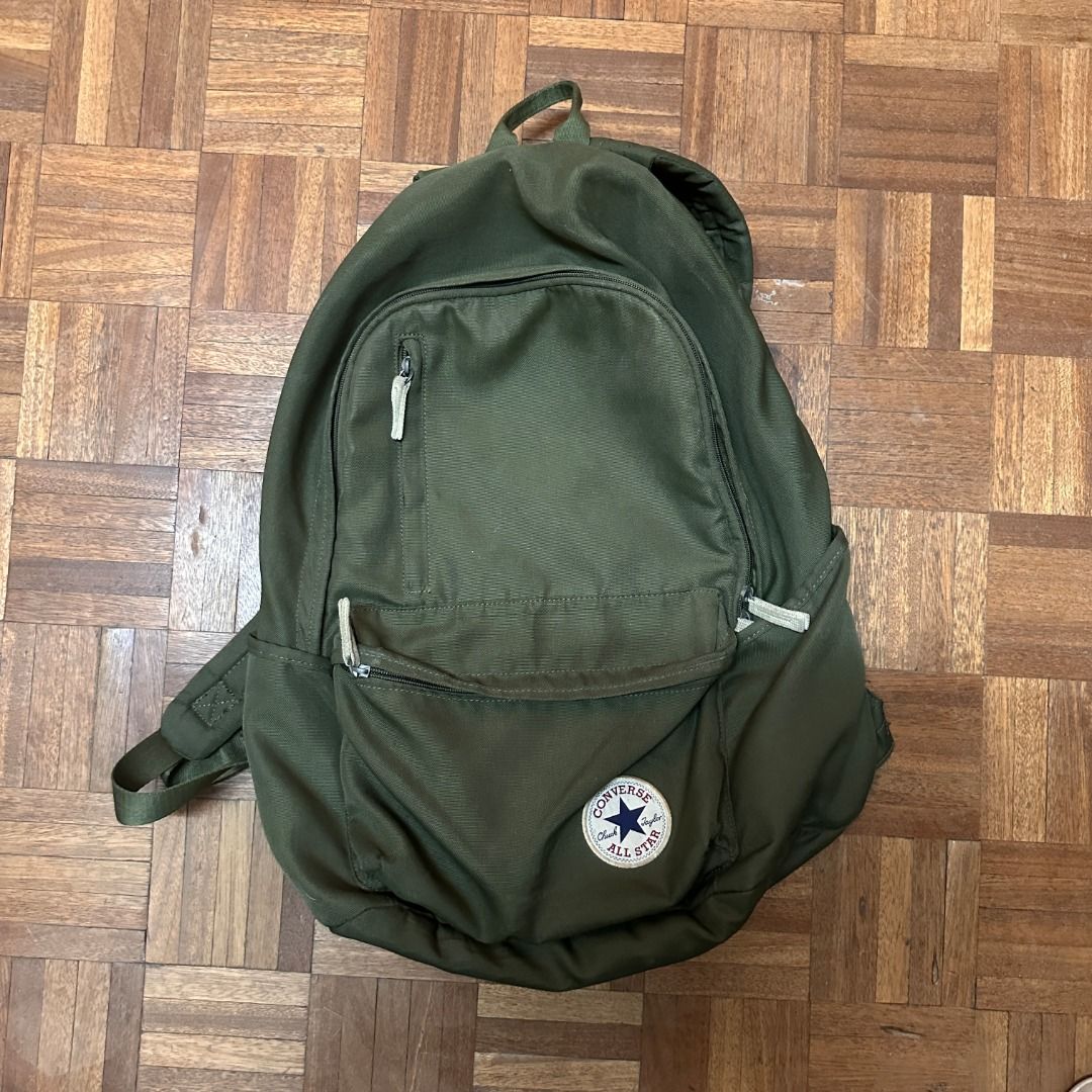 Converse Backpack Olive Green (Category: Backpacks) located in Angeles City. Submitted by kevinsdecluttering (Listing ID 1432823422, Image 2). Description: - ORIGINAL Olive green Converse backpack - Main compartment and front pocket - Green interior lining - Adjustable shoulder straps - Durable fabric - Converse brand tag Honest Issue: Small tear in the inside lining. Can send pictures if you want. 8/10 Condition. Slightly negotiable.
