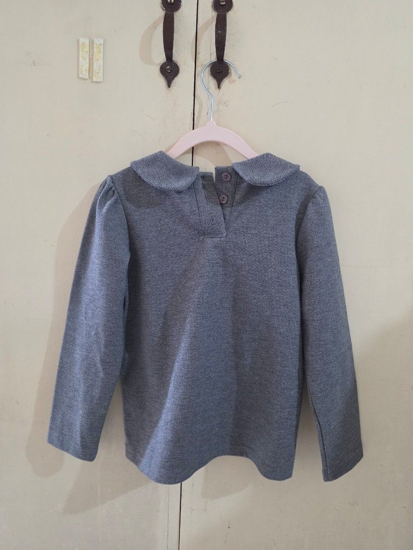 Cotton Candy Gray Lomg Sleeves Size 130 (Category: Babies & Kids Fashion) located in Manila. Submitted by dshopco (Listing ID 1432803767, Image 2). Description: Gray jacket from Cotton Candy - Size 130 - Round collar - Long sleeves - Two blue buttons - Ruffle detail on the front Color may vary vs actual due to lighting. Please manage expectations as this preloved..